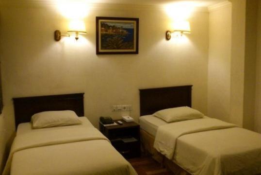 Hotel Citi International Palang Merah Medan Pokoj fotografie